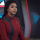 Star Trek: Discovery's Captain Michael Burnham sits on the bridge of her ship.
